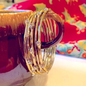 Crystal goldtone bracelet set of five.